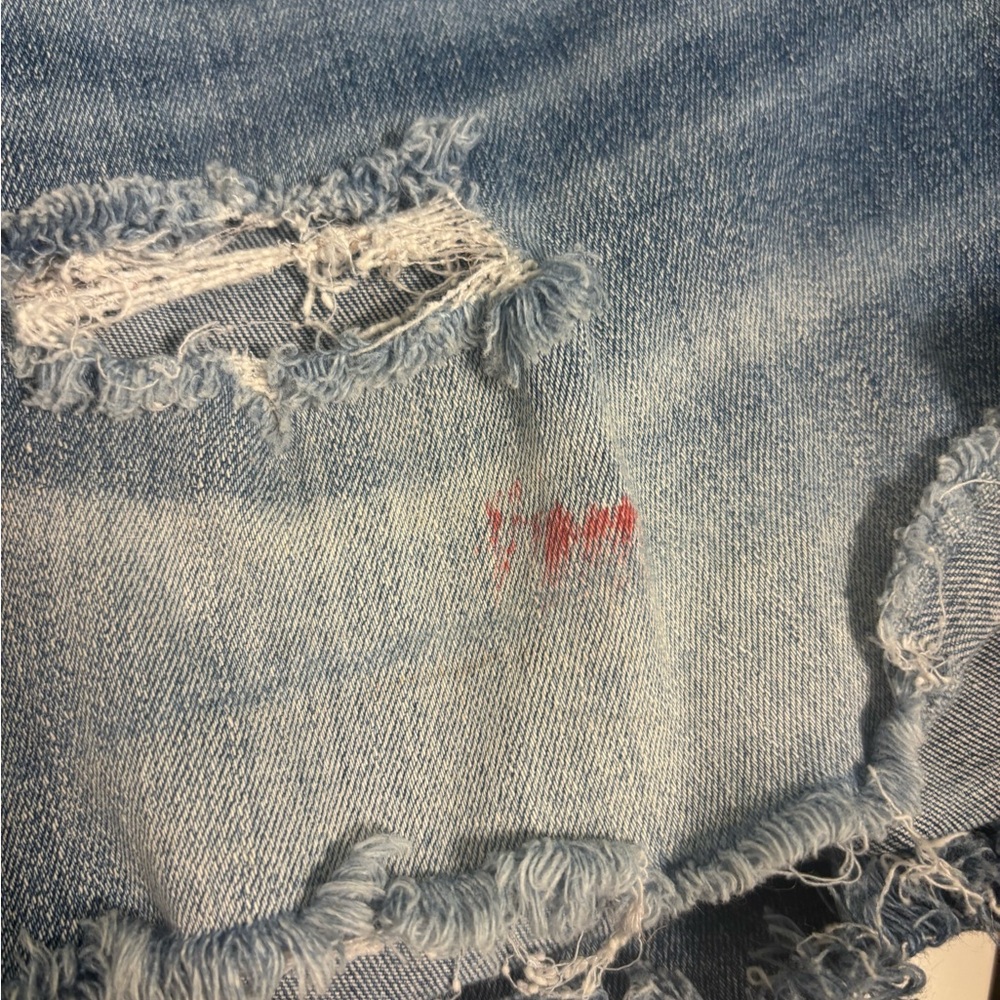 Distressed Blue Denim Jeans